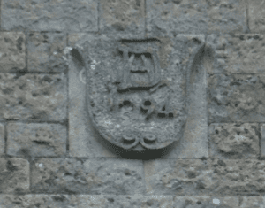 The fine, simple, elegant, clear date-stone on the front of the house of Geoff Knapp (Hon. Vice- President of the Corsham Civic Society) in South Street, a street with an interesting number of date-stones, revealing the building develop- ment of the street, close to the railway station, at the time of the greatest expansion and prosper- ity of the trade in Corsham stone in the 1880s and 1890s.