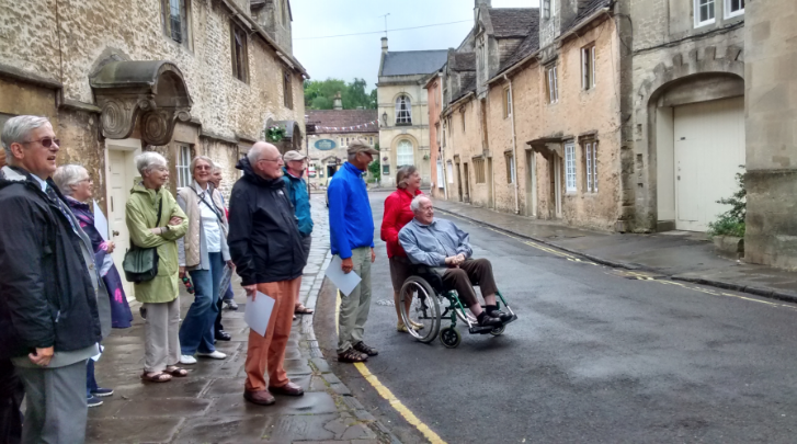 Michael Ramsey, far left, leads a walking group through Church Street in Corsham