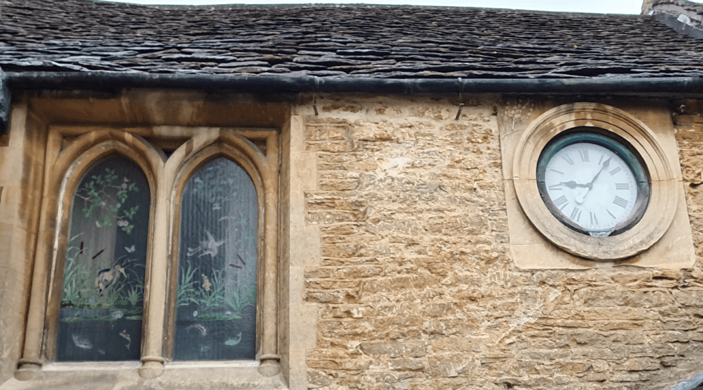 Thos. Bullock clock in the frontage wall of the Masonic Hall, Pickwick